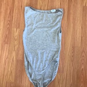 A grey bodysuit, size Large.